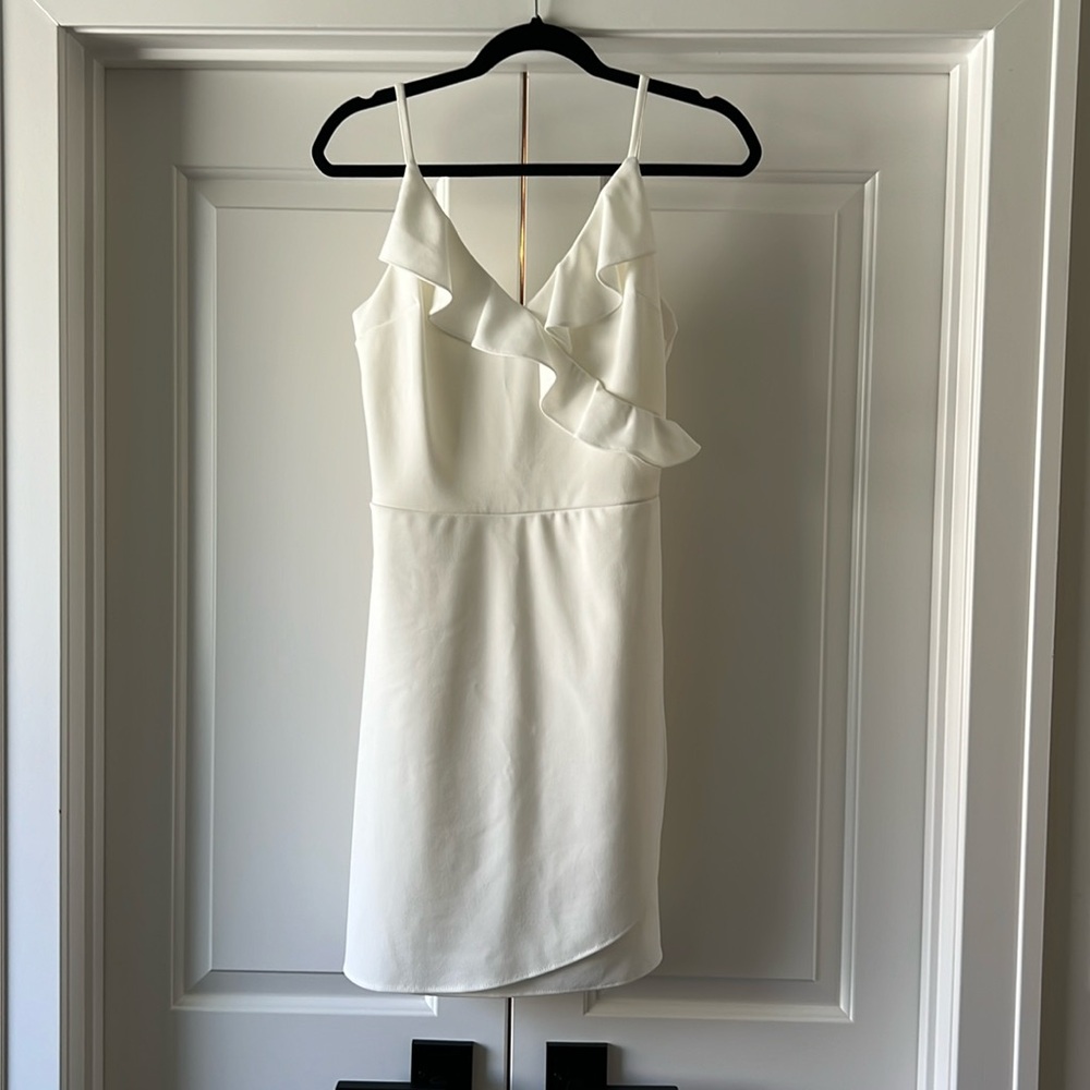 White ruffle mini dress